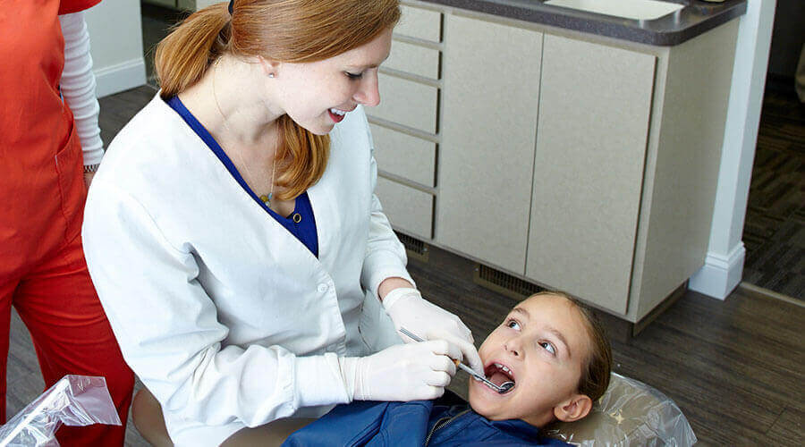 child getting a dental exam